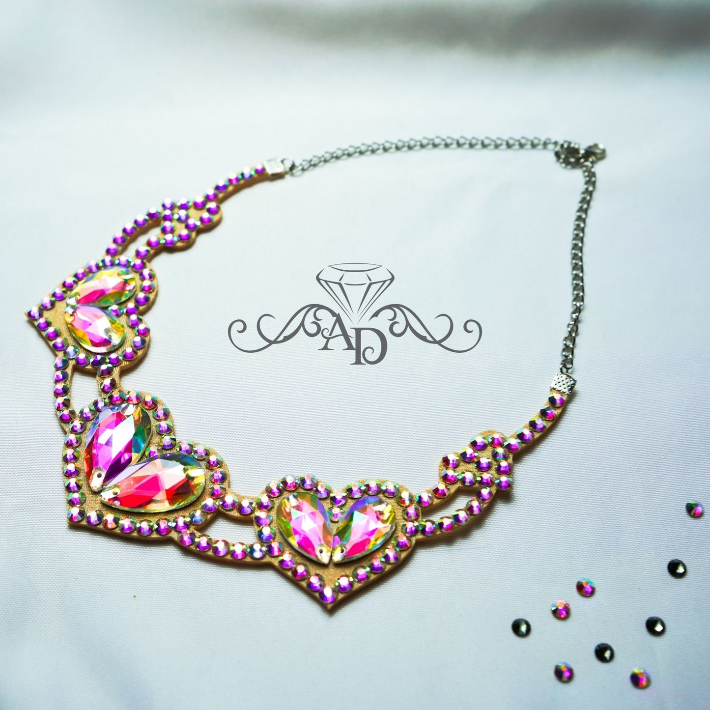 Crystal AB ballroom dance necklace with heart design, elegant belly dance jewelry by Amalia Design. Rhinestone dance necklace perfect for stage performances and competitions